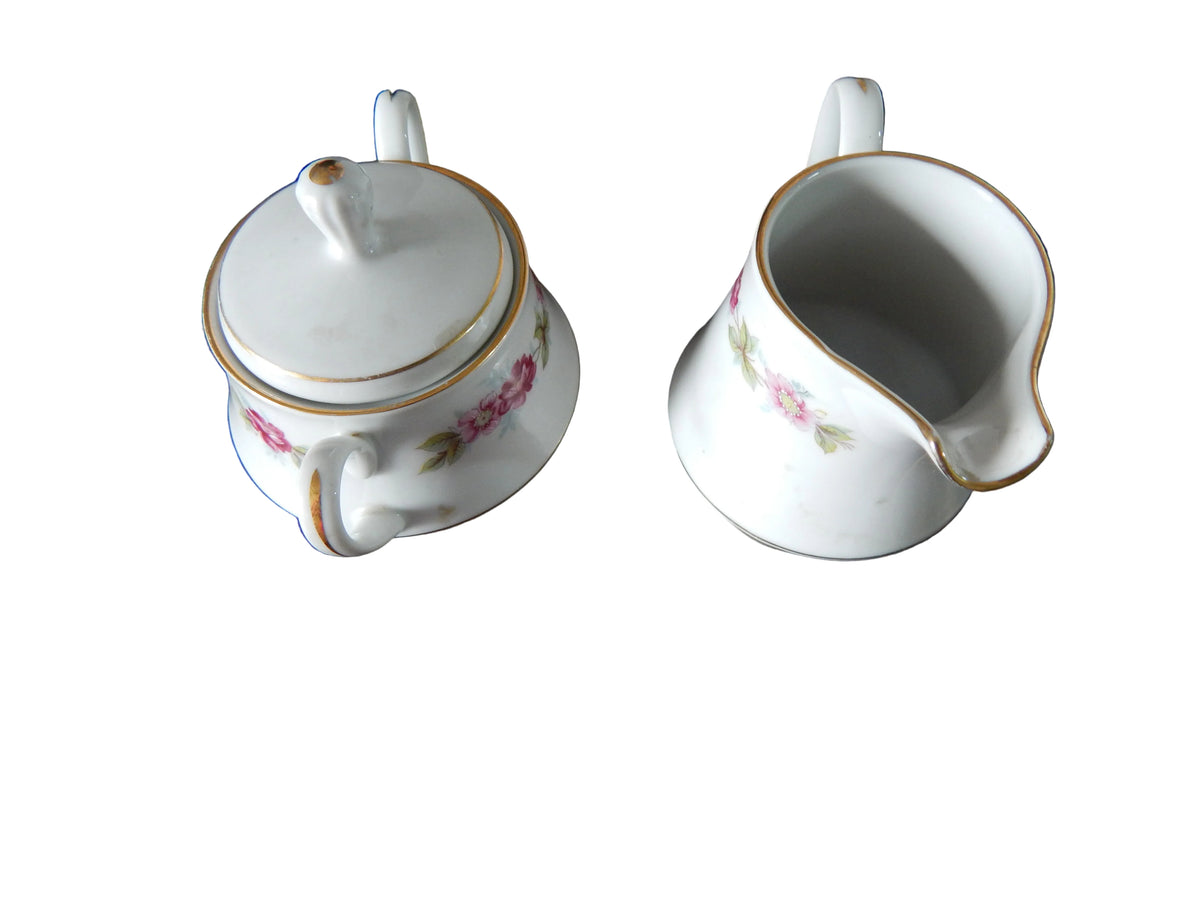 Vajilla Antigua de Porcelana (Diseño  Perimetral de Guirnaldas y Rosas)