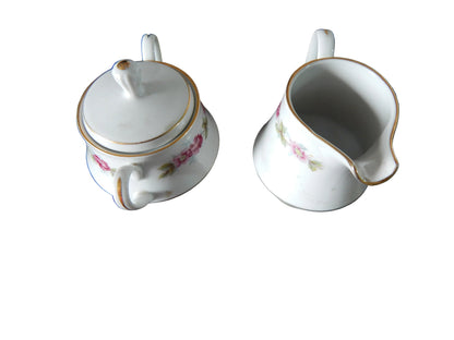 Vajilla Antigua de Porcelana (Diseño  Perimetral de Guirnaldas y Rosas)