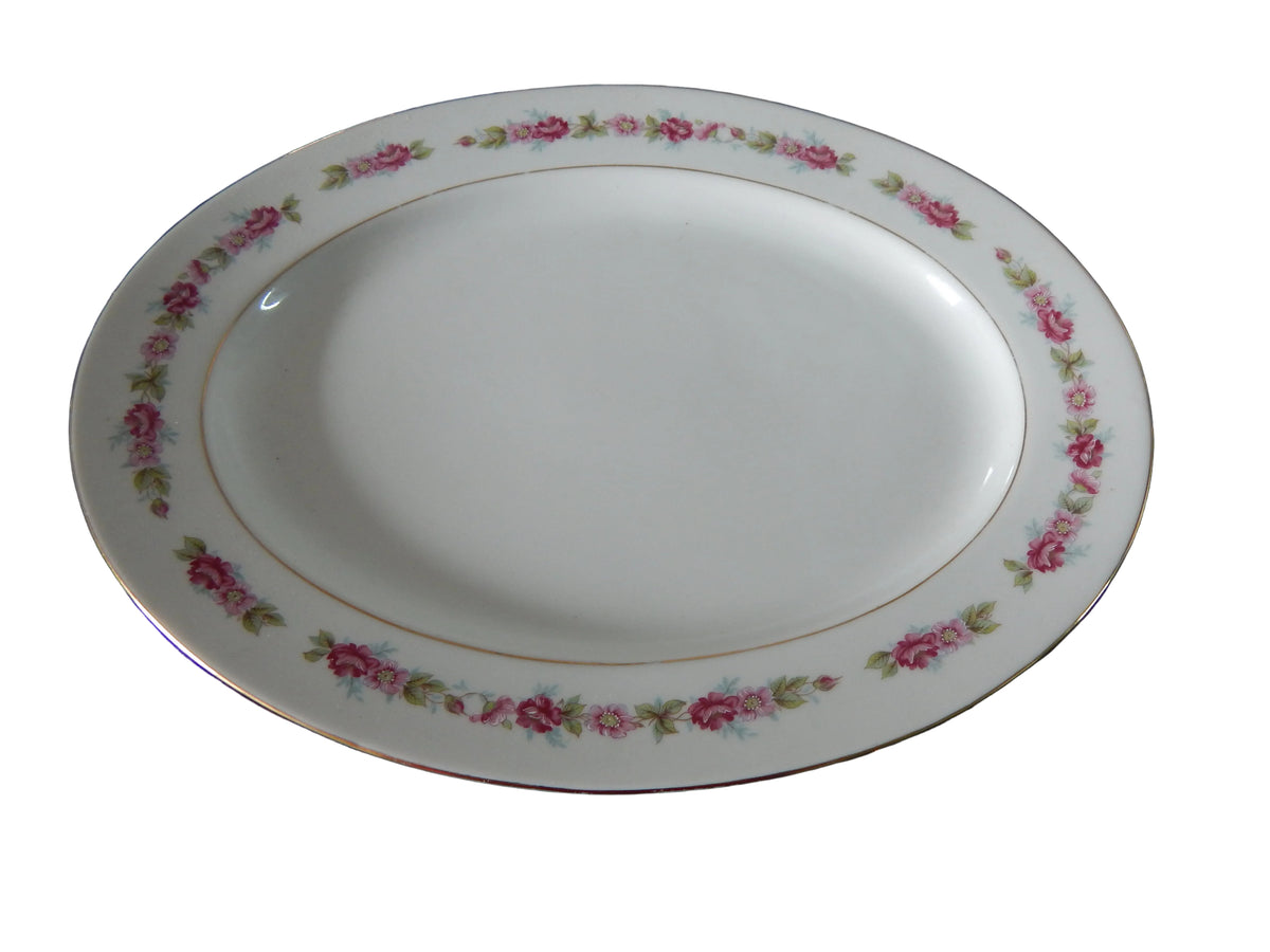 Vajilla Antigua de Porcelana (Diseño  Perimetral de Guirnaldas y Rosas)
